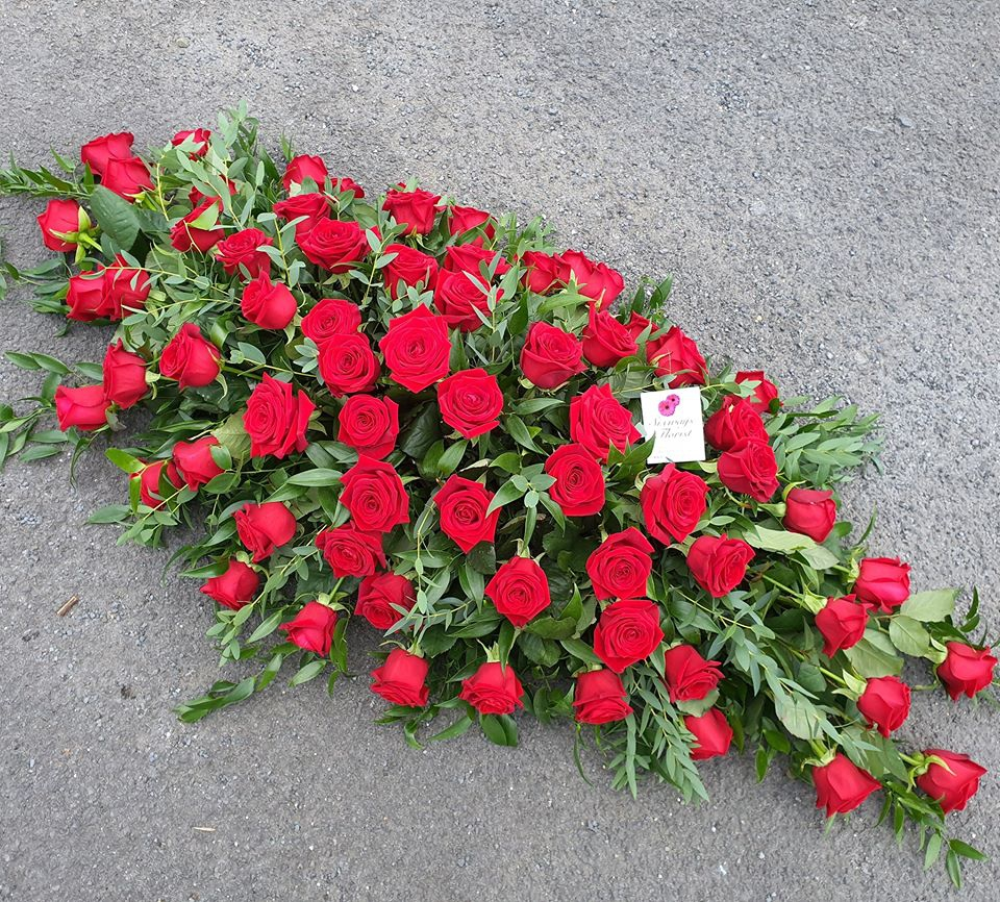 red rose casket spray
