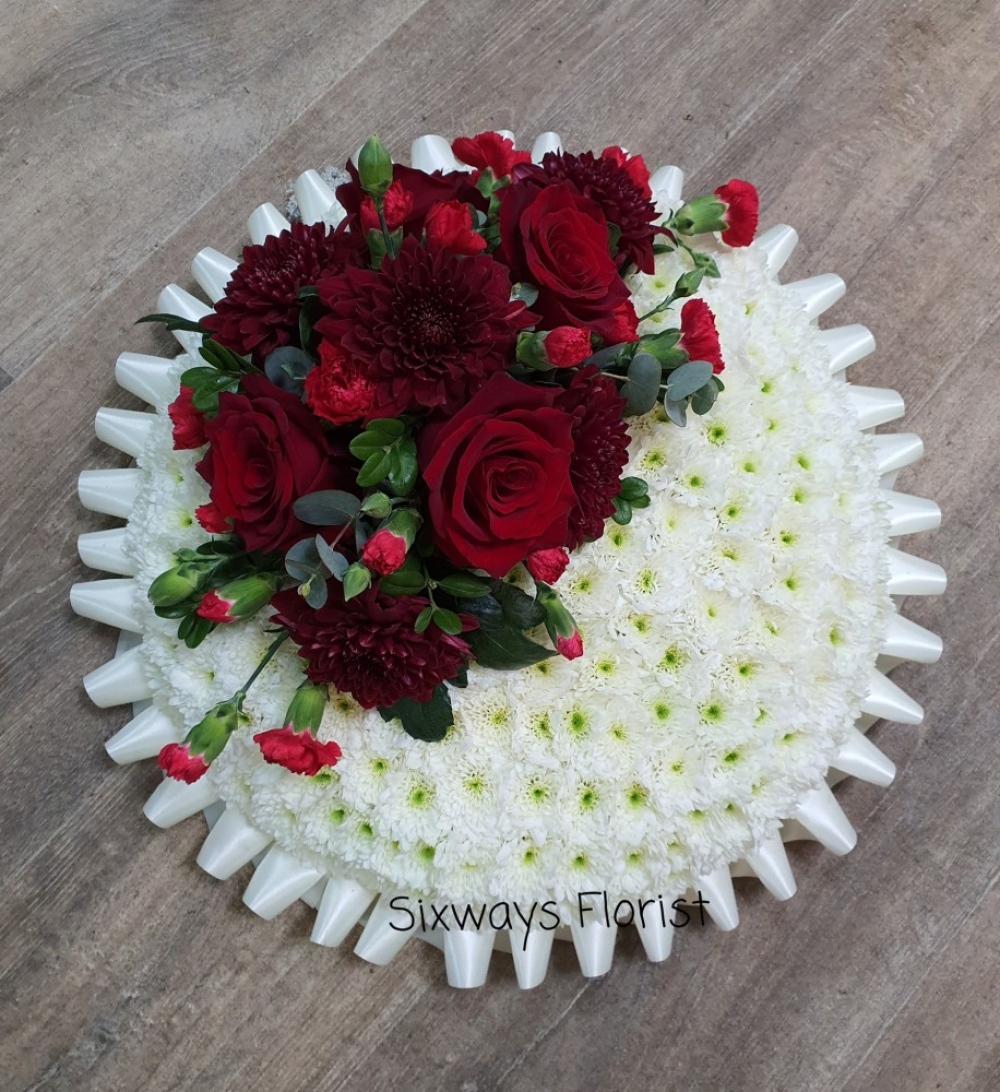 Large round cushion with red